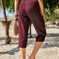 Back view of Women's Pocketed Elastic Waist Capris in burgundy, highlighting the easy-going style and breathable fabric.