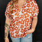 Plus Size Printed Tie Neck Short Sleeve Blouse