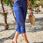 Side view of Women's Pocketed Elastic Waist Capris in blue, highlighting the stylish pockets and relaxed fit.
