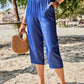 Close-up of Women's Pocketed Elastic Waist Capris in blue, showcasing the quality fabric and pocket placement.