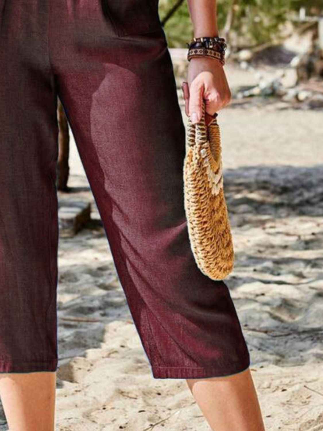 Close-up detail of Women's Pocketed Elastic Waist Capris in burgundy, featuring the premium fabric and chic pocket design.