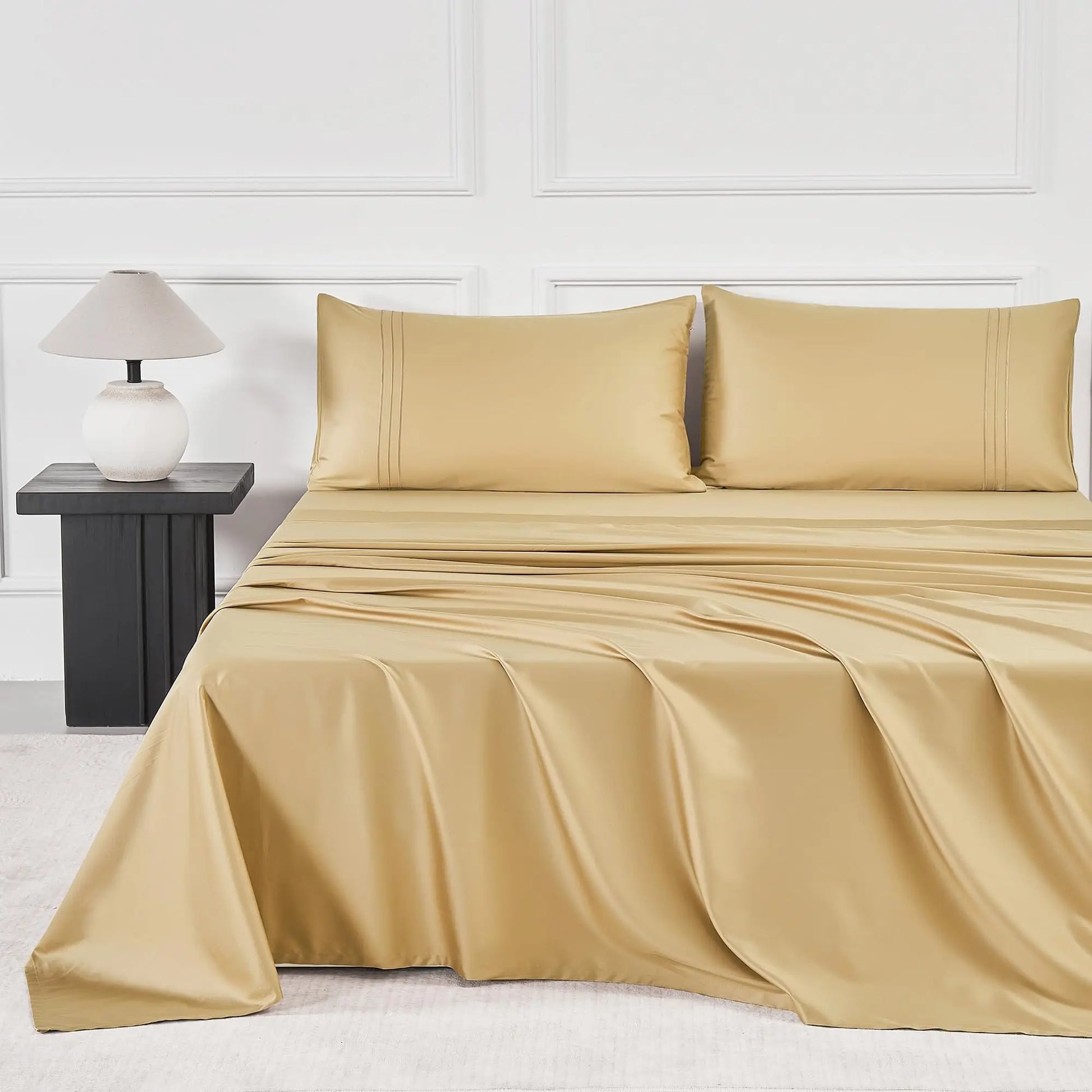 JELLYMONI Soft Cool Cotton Sateen Sheets in a vibrant golden color, elegantly placed on a bed, underscoring high-quality fabric and design.