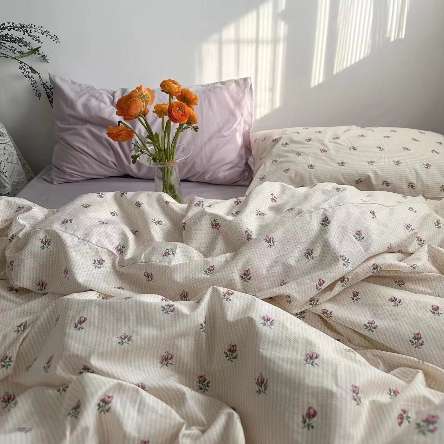 Artistic layout of flower-patterned bedding showcasing Zimonto's INS Pink Bedding, creating a serene and stylish ambiance.