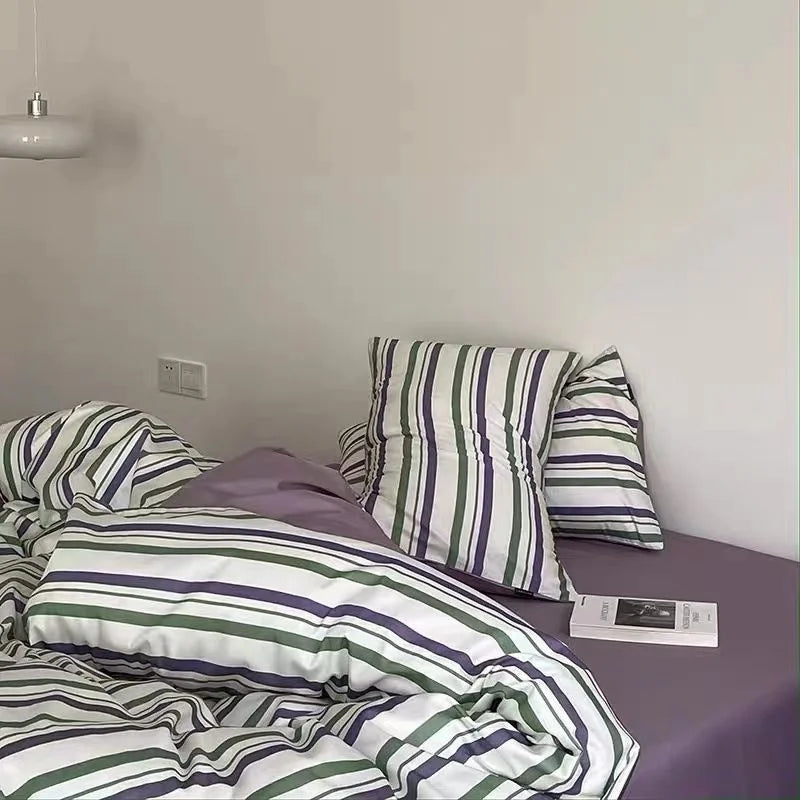 Bright and stylish multi-colored striped bedding, showcasing Zimonto's INS Pink Bedding for a modern bedroom setting.