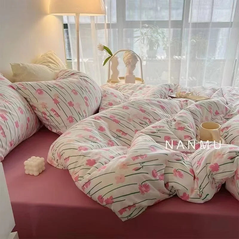 Stunning pink floral bedding arrangement capturing natural light, featuring Zimonto's INS Pink Bedding for a fresh and inviting space.