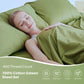 JELLYMONI Soft Cool Cotton Sateen Sheets featuring a model peacefully sleeping on a luxurious green bed set, emphasizing breathability and 400 thread count comfort.
