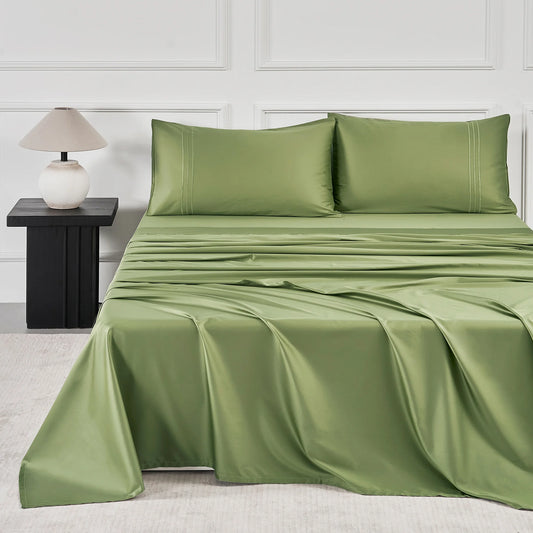 JELLYMONI Soft Cool Cotton Sateen Sheets displayed on a bed with a modern aesthetic, featuring a chic green color and matched with stylish pillows.