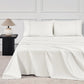 JELLYMONI Soft Cool Cotton Sateen Sheets in a crisp white color, elegantly styled on a modern bed with matching pillows, ideal for a fresh and clean bedroom aesthetic.