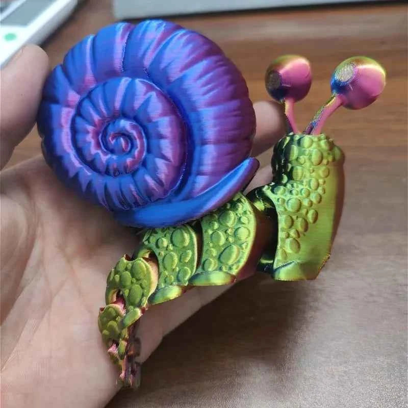 Colorful articulated 3D printed snail toy with vibrant shell and flexible body for creative play
