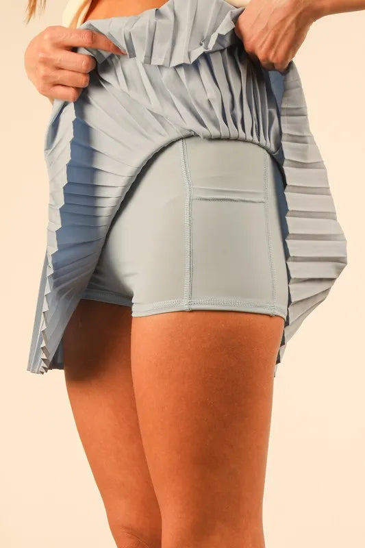 Close-up view of the inside of the Pleated Activewear Skirt with Built-In Shorts for Comfort and Style - Zimonto, showing the built-in shorts for added comfort.