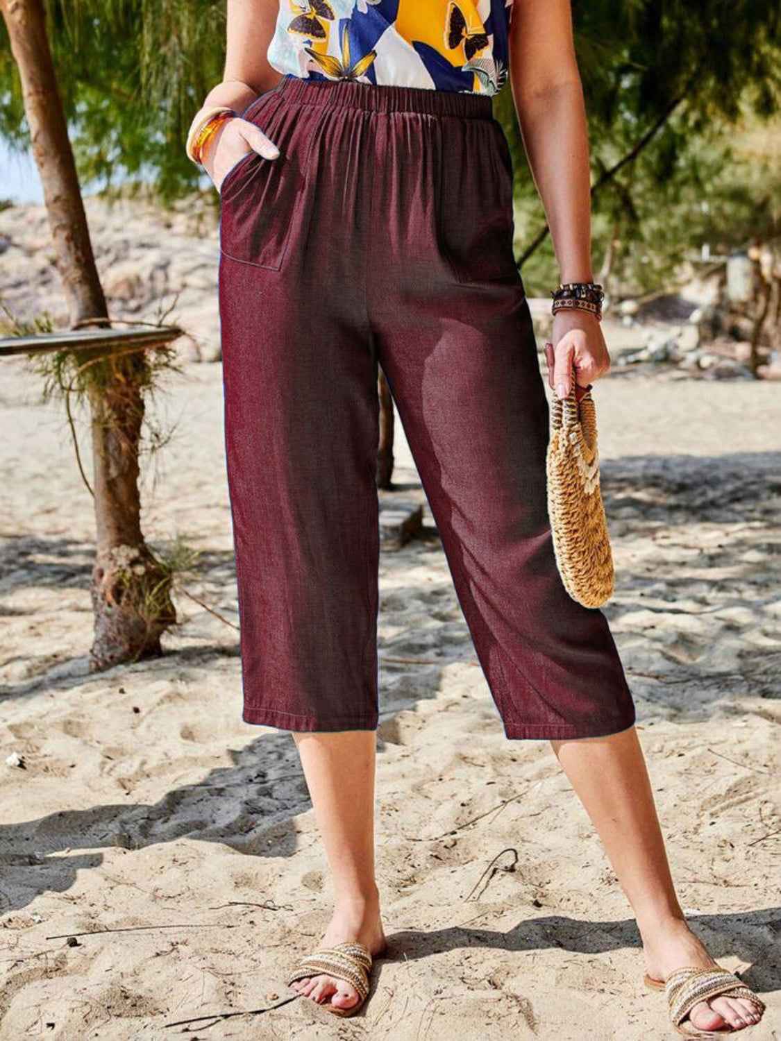 Women's Pocketed Elastic Waist Capris in burgundy, designed for comfort with an elastic waistband and chic pockets.