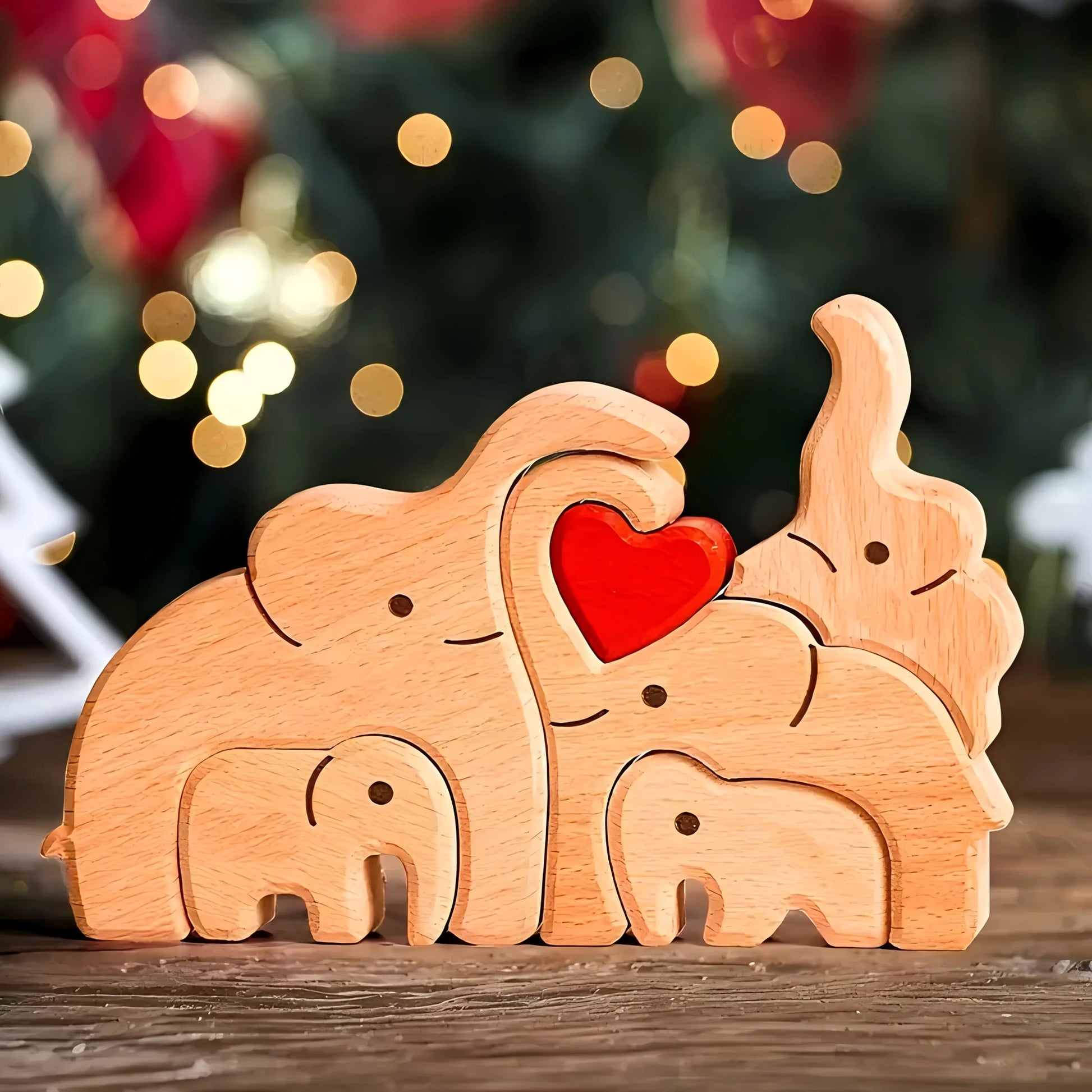 Personalized wooden elephant family sculpture featuring a heart design for a unique home decor piece