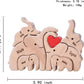 Personalized wooden elephant family sculpture featuring five cute elephants with names and a heart in red