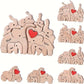 Personalized wooden elephant family sculpture featuring unique names and a red heart accent