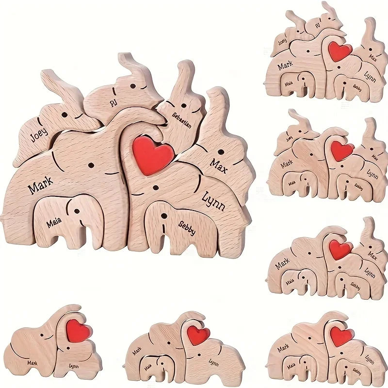 Personalized wooden elephant family sculpture featuring unique names and a red heart accent
