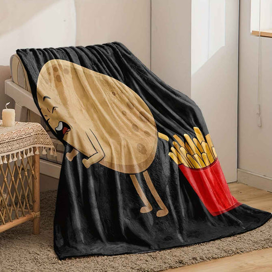 Cozy whimsical french fry blanket featuring a playful potato and fries design for fun home decor