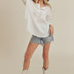Zimonto - Aemi + Co Exposed Seam Raw Hem Half Button Top